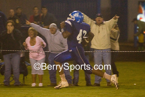 3-391-0772 Logan Terrell, with fans pointing the way, scores the winning touchdown, putting Madison up 21-14 over Page.