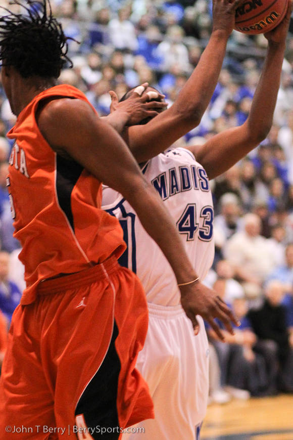 This wasn't called a foul....and Logan made the shot!